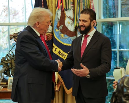 Al-Sharaa shakes hands with Trump