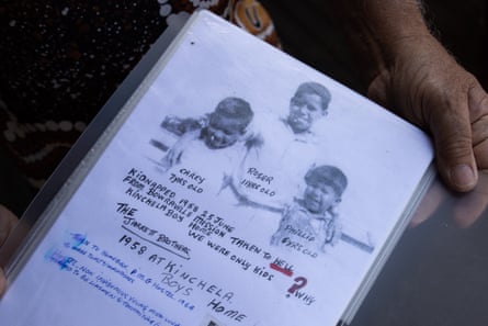 ‘Taken to hell’: Uncle Roger Jarrett shows his scrapbook with pictures of his siblings.