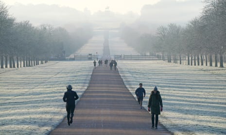 Runners and walkers on the Long Walk near Windsor Castle in Berkshire, during freezing temperatures last month