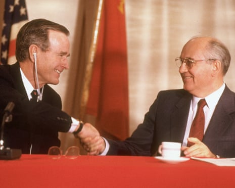George Bush and Mikhail Gorbachev shaking hands during the Malta summit press conference, 3 December 1989.