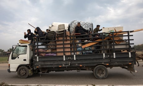 Displaced Palestinians make their way to Rafah after Israeli warnings of increased military operations