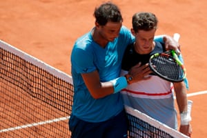 Rafael Nadal embraces Diego Schwartzman as he celebrates after his victory over the Argentine.