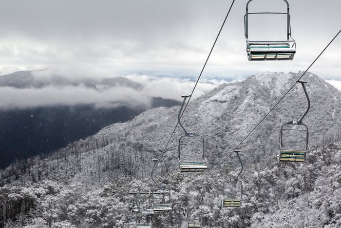 Australian mountain regions hit by summer's bushfires now blanketed by snow  | Australia news | The Guardian