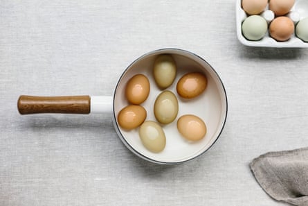 Eggs in a pan of water.