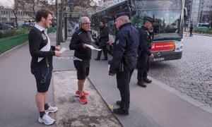 French police officers patrol and control citizens while a strick lockdown comes into in effect to stop the spread of the Covid-19