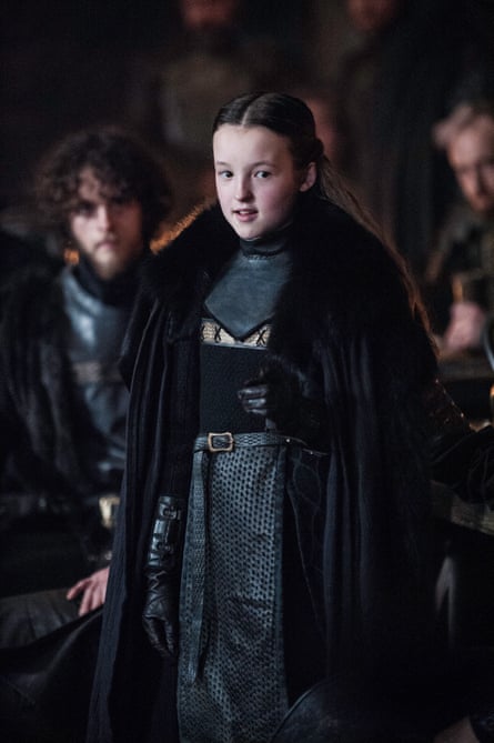 Bella Ramsey in dark clothing from the middle ages