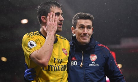Dr Gary O’Driscoll helps Arsenal’s Sokratis Papastathopoulos off the pitch earlier this season.