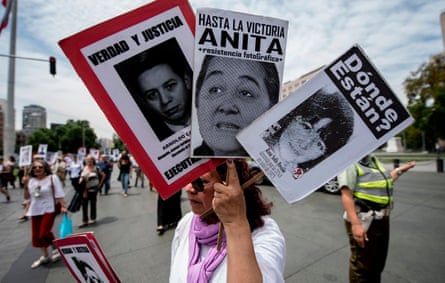 Relatives of people who disappeared during the military dictatorship demand Sebastian Piñera’s government to speed up the search for victims, during a demonstration in front of the La Moneda presidential palace in Santiago