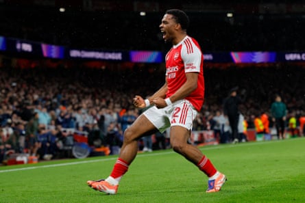 Arsenal's Jurriën Timber celebrates scoring their first goal against Bayern