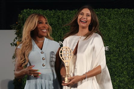 Serena Williams and Maria Sharapova laugh together at the latter's induction into the tennis hall of fame
