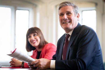 Phillipson with Keir Starmer last October, at a desk, with papers.