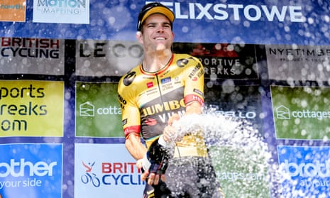 Wout van Aert of Jumbo-Visma sprays champagne after winning stage five of the 2023 Tour of Britain.