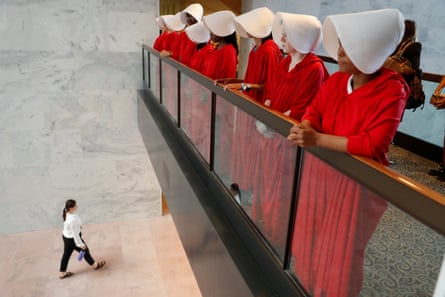 Demonstrators dressed as handmaidens awaiting the arrival of Kavanaugh prior to his confirmation hearing in September.