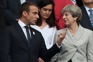 Getting his point across? Macron and May continue their discussions in the stands. Earlier, the French president said the door to the EU remains open to Britain