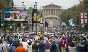 Pope Francis is seen on a huge screen on Benjamin Franklin Parkway in Philadelphia.