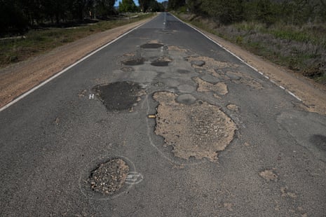 Potholes along a road in Walwa, Victoria.