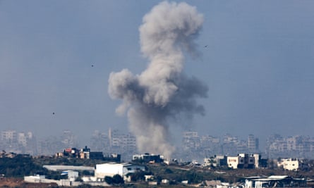 Smoke rises over central Gaza after a strike.