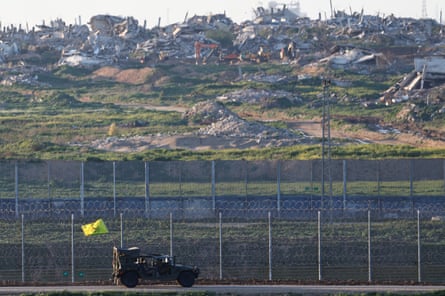 An Israeli military vehicle patrolling the Israeli side of the border with Gaza.