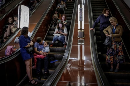 People shelter inside a subway station during an air-raid alert in Kyiv, May 2023.