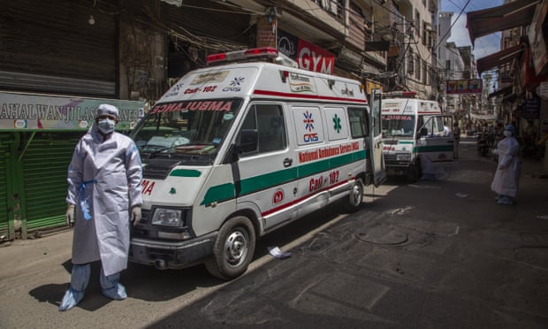 Ambulances waiting to take members of the Islamic group Tablighi Jamaat to a quarantine facility.