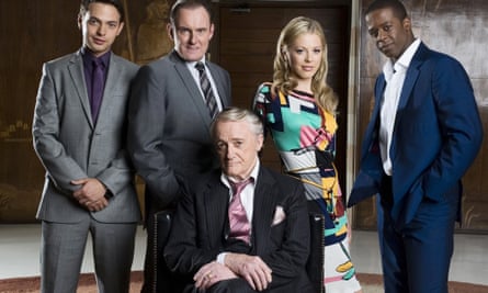 Robert Vaughn, foreground, in Hustle (2009) with, from left, Matt Di Angelo, Robert Glenister, Kelly Adams and Adrian Lester.