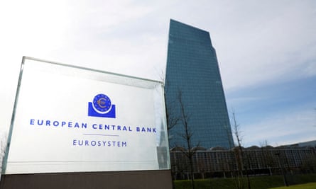 The European Central Bank sign outside a large glass skyscraper
