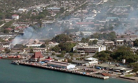 Smoke rises over Dili