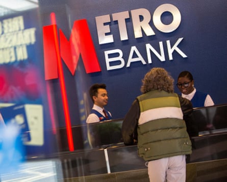 Staff and customers in the Metro Bank branch in Holborn, London