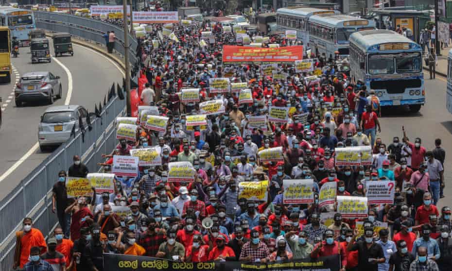 Sri Lanka's Socialist Youth Union hold a protest march in Colombo on Friday demanding a solution to the economic crisis.