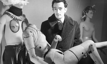 Salvador Dalí holding an artist’s lay figure (the chauffeur in the Taxi pluvieux), International Exhibition of Surrealism, Paris, 1938.