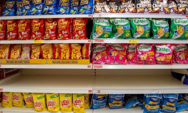An empty shelf in the crisps section in a Sainsbury’s store.