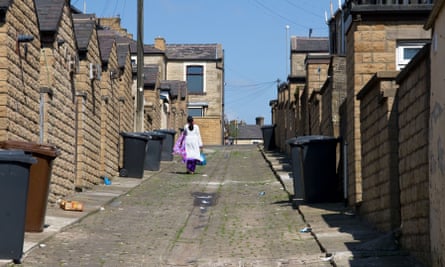 Back alleyway of terraced housing, Nelson, Burnley, Lancashire, England, UK