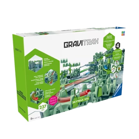 Product box showing a GraviTrax green marble run toy with towers, slides and canyons