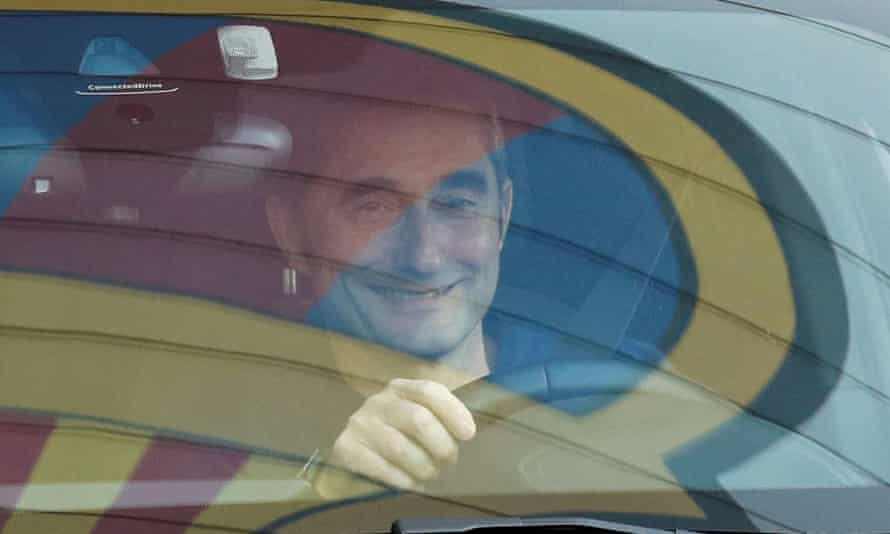 Ernesto Valverde smiles as he drives away from Barcelona’s training ground after being sacked on 13 January 2020