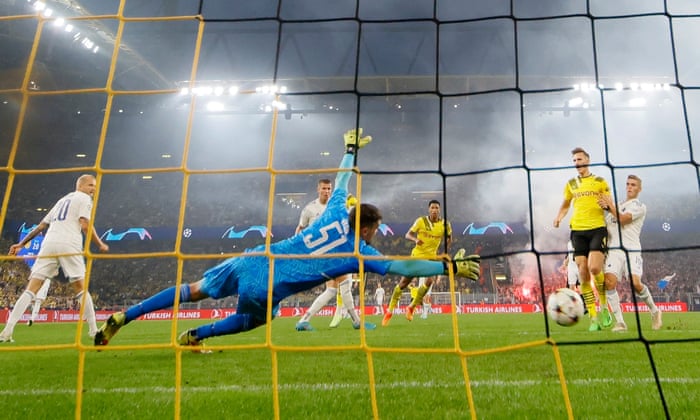 Jude Bellingham (centre, rear) drills home Borussia Dortmund's third goal.