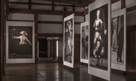 Images suspended on Shoji panels hang in the historic Nijo-jo Castle