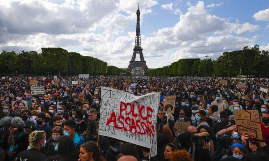People demonstrate in Paris on Saturday over the death of George Floyd.