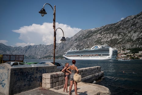 Locals watch ship Emerald Princess leave Kotor, Montenegro