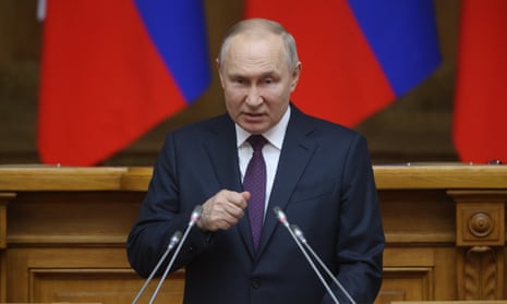 vladimir Putin speaks at the Council of Lawmakers annual plenary session on 27 April.