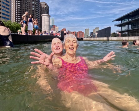 Two women swimming