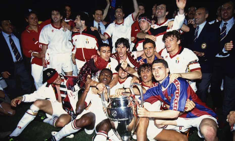 Milan’s players celebrate the victory with trophy after winning the 1994 Champions League final.