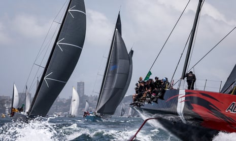 Andoo Comanche competes during the start of the Sydney to Hobart yacht race