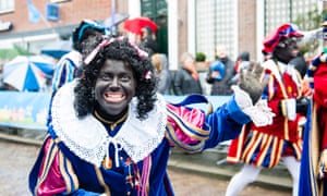 The demonstrators were on their way to Dokkum, above, to protest against the inclusion of Zwart Piet in the town’s festival.