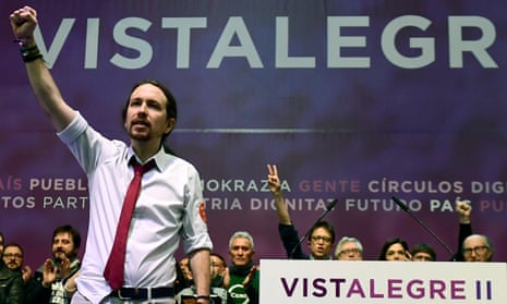 Pablo Iglesias raises a triumphant fist after being re-elected as secretary general of Podemos