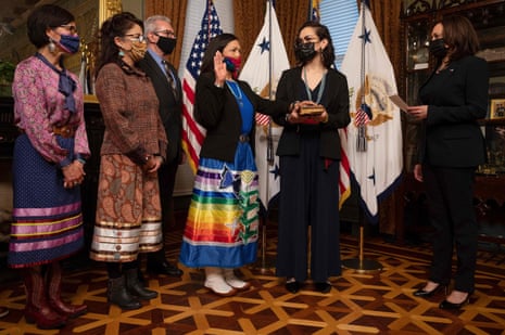US Vice President Kamala Harris (R) swears in US Interior Secretary Deb Haaland on March 18, 2021 at the Eisenhower Executive Office Building Ceremonial Office in Washington, DC. (Photo by Jim WATSON / AFP) (Photo by JIM WATSON/AFP via Getty Images)