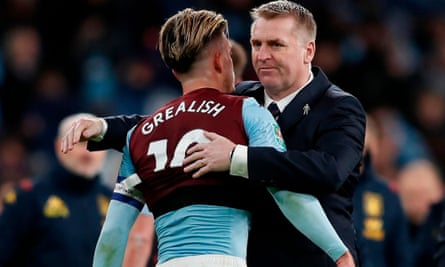Jack Grealish and Dean Smith embrace
