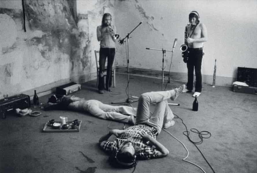 Laid back … Keith Richards takes a nap as a horizontal producer Jimmy Miller records trumpeter Jim Price and saxophonist Bobby Keys.