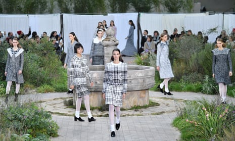 Models walk the runway during the Chanel show