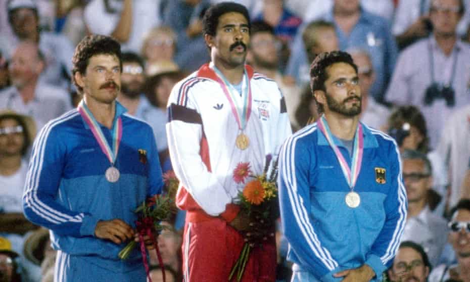 The decathlete Daley Thompson stands atop the podium with his gold medal in 1984 and his great rival, Jürgen Hingsen, on the left with his silver.