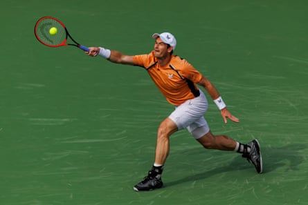 Andy Murray strains for a forehand against David Goffin